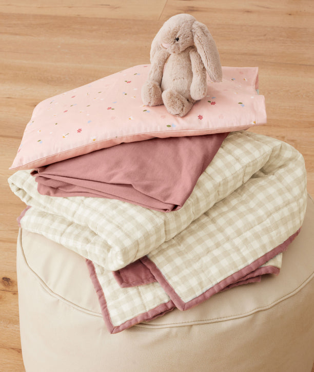 ergoPouch quilt for toddlers and kids, made from soft, organic, and sustainable materials, designed to provide a cosy and gentle night's sleep.