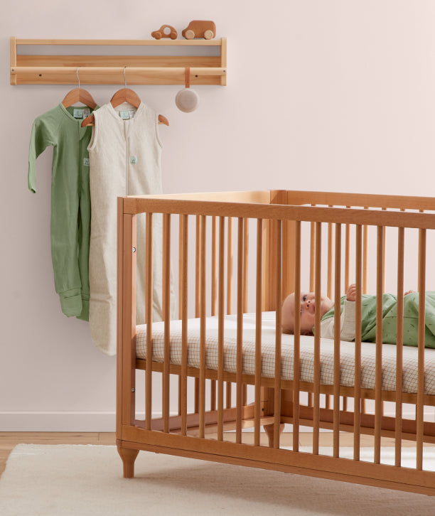 Infant nursery furniture and accessories from ergoPouch, designed for your infant's sleep journey, combining functionality and style.