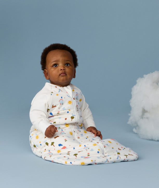 ergoPouch TOG-rated sleeping bag for babies, made from organic, breathable materials and featuring cute prints for comfortable sleep.