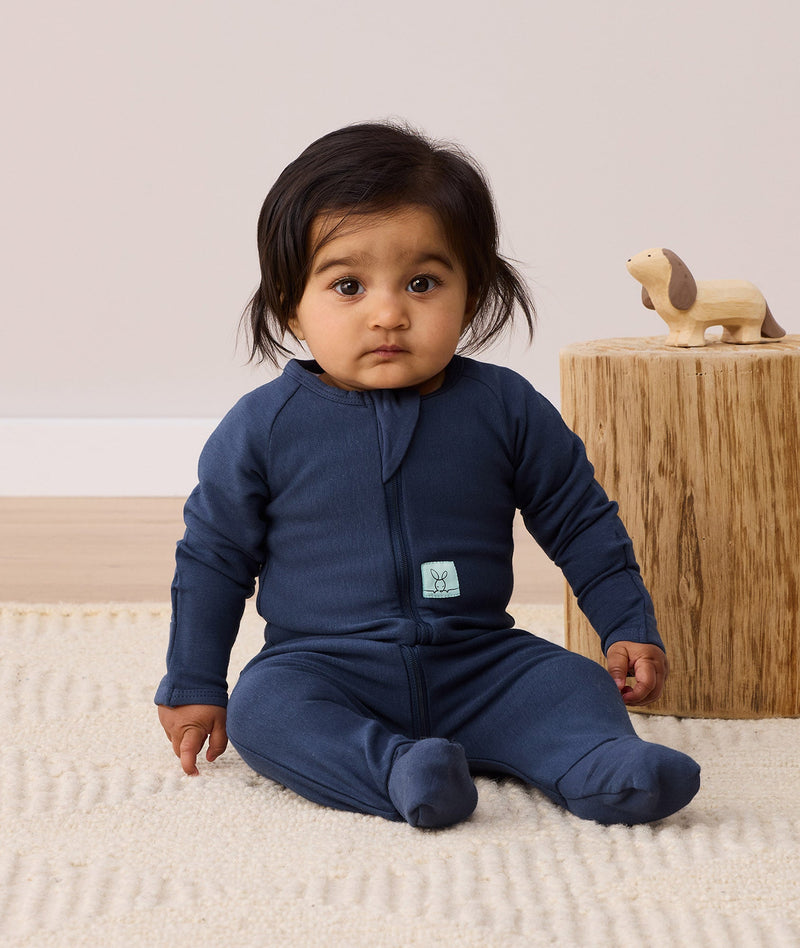 ergoPouch layer sleepwear for babies and kids, crafted from organic cotton and TOG-rated to ensure comfortable sleep.
