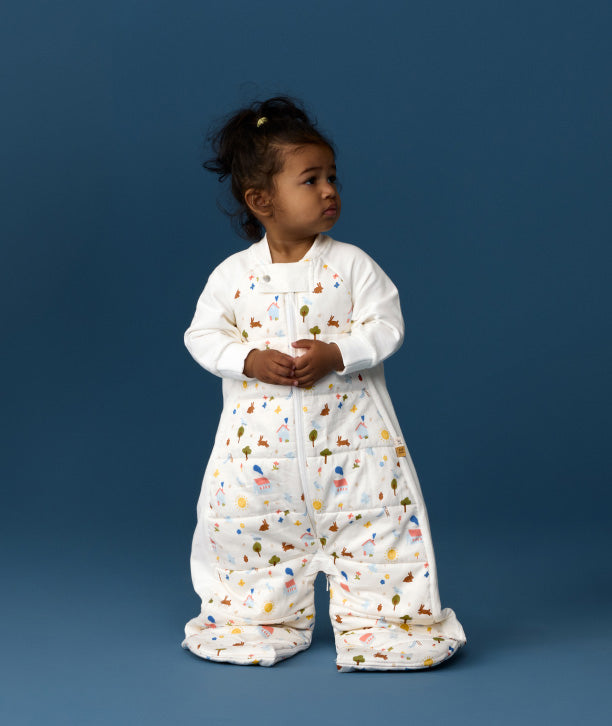 ergoPouch TOG-rated toddler sleeping bag made from organic, breathable materials, featuring cute prints for ultimate comfort.