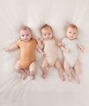 3 Babies Wearing ergoPouch Bodysuit-2
