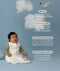 Baby in a white sleeping bag with text about its features on a light blue background