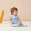 Infant wearing an ergoPouch Sleeping Bag Shadowlands