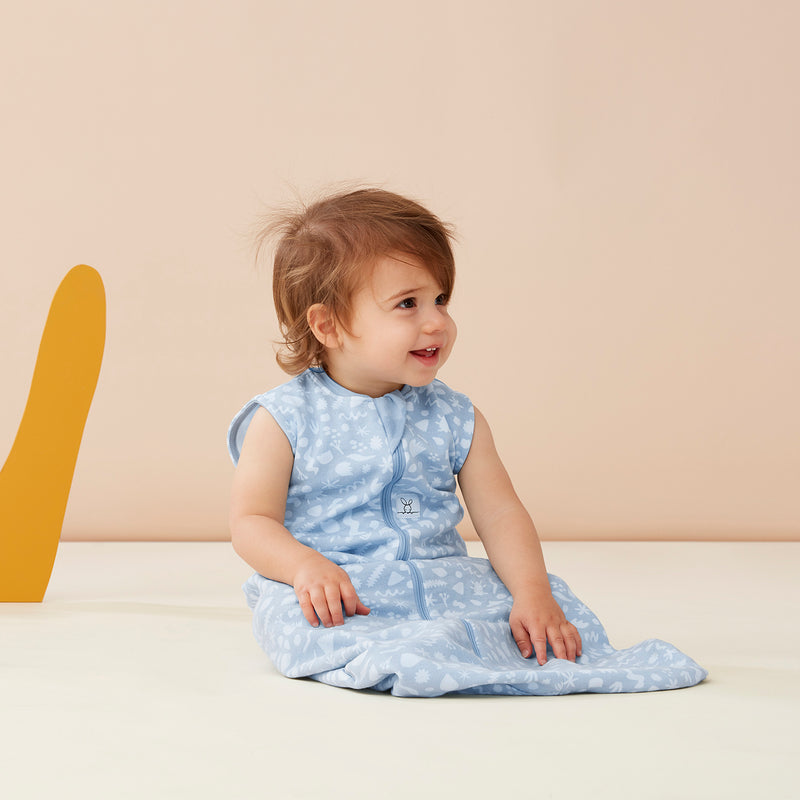 Infant wearing an ergoPouch Sleeping Bag Shadowlands