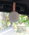 A lightweight, circular Drift Away White Nosie machine suspended by a food-grade silicone strap attached to a car handle. Text overlay titled 