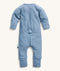 Back view of the ergoPouch Long Sleeve Layer in Cornflower, featuring a unique zip system for easy nappy changes and dressing.