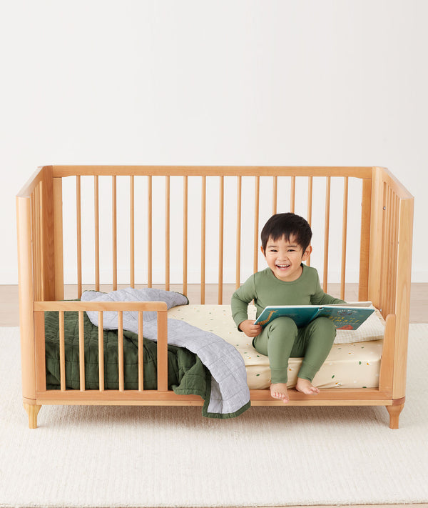 Quilted Coverlet 3.5 TOG Hunter Stripe toddler sitting in bed