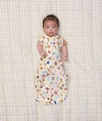 Cocoon Swaddle Bag 1.0 TOG Bon Appetit newborn arms out