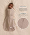 Baby swaddled in a Cocoon Swaddle Bag in Taupe Marle with callouts highlighting 