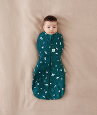 Baby wearing a Cocoon Swaddle Bag 1.0 Tog with its arms in