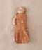 Baby wearing a Cocoon swaddle Bag 1.0T with one arm out