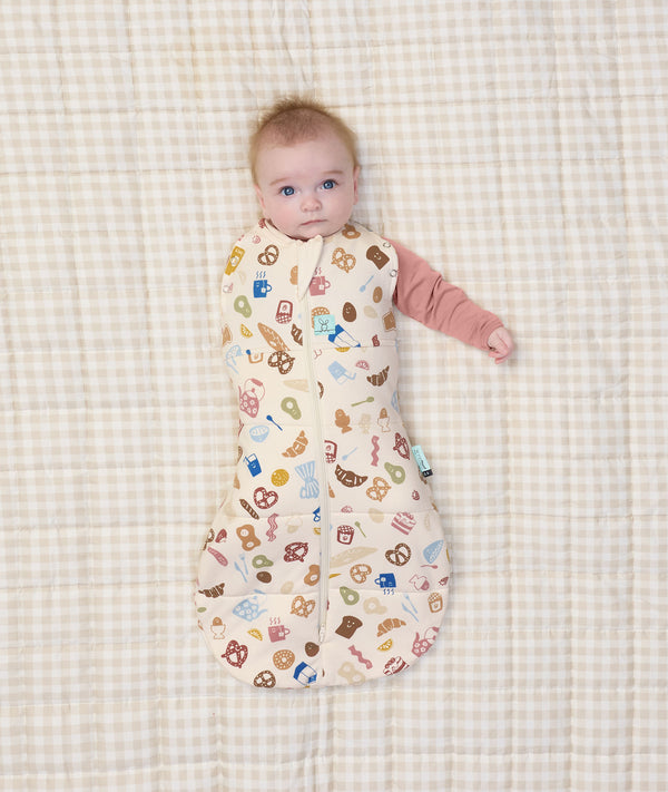 Cocoon Swaddle Bag TOG Bon Appetit newborn one arm out