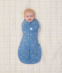 Cocoon Swaddle Bag Petit Pretzel newborn swaddled arms in