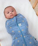 Cocoon Swaddle Bag Petit Pretzel newborn lying in cot