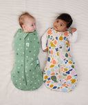 Two babies wearing Cocoon swaddle Bag 2.5 TOG Tutti Fruity collection