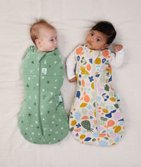 Two babies wearing Cocoon swaddle Bag 2.5 TOG Tutti Fruity collection