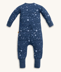 Back view of the ergoPouch Sleep Onesie 2.5 TOG in Starbeam, featuring a blue base color and star and moon all -over print.