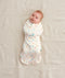 Baby swaddled in  0.2 TOG Cocoon Swaddle Bag Desert Bloom