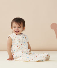 Infant wearing an ergoPouch Sleeping Bag in Desert Bloom