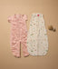 Flat lay showcases the Sleep Suit Bag in Elephant Parade and the Sleeping Bag in Savannah.