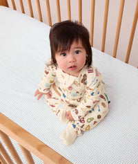 Long Sleeve Layer 1.0 TOG Bon Appetit infant sitting in cot