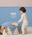 Toddler in cream Long Sleeve Pyjamas with subtle print, featuring a drop hem feature callout.