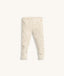 Cream patterned Pyjama pants with ankle cuffs set against a plain background.