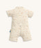 Back view of a cream patterned Short Sleeve Layer featuring a rear zip, set against a plain background.