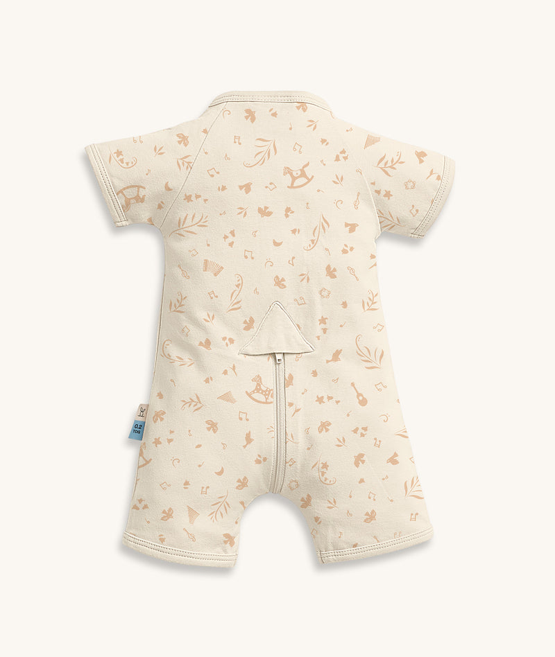 Back view of a cream patterned Short Sleeve Layer featuring a rear zip, set against a plain background.
