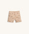Beige patterned pyjama shorts featuring elastic waistband.