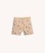 Beige patterned pyjama shorts featuring elastic waistband.