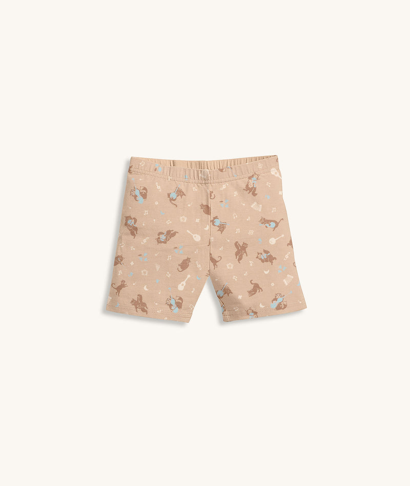 Beige patterned pyjama shorts featuring elastic waistband.