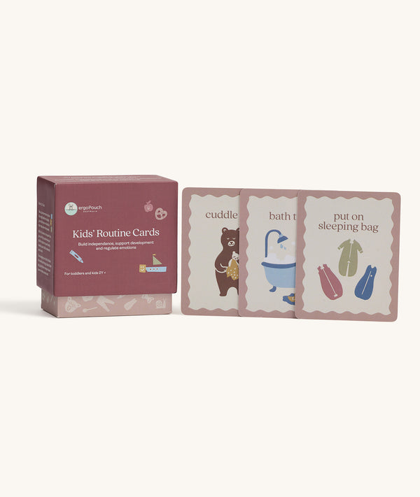 Product shot of Kids' Routine Cards. The set includes a box and various cards with simple illustrations and text designed to help children follow daily schedules.