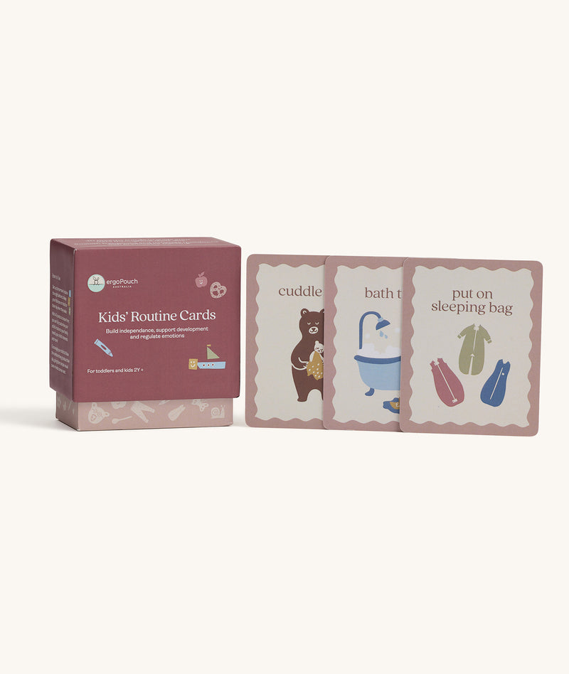 Product shot of Kids' Routine Cards. The set includes a box and various cards with simple illustrations and text designed to help children follow daily schedules.