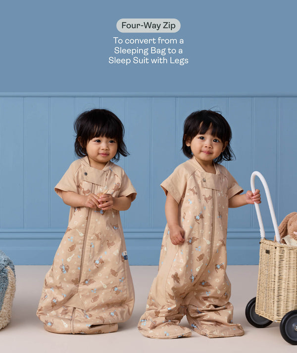 Toddler wearing convertible sleep suit bag, demonstrating the bag mode on the left and separate legs mode on the right.