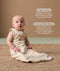 Baby wearing a sleeveless, patterned sleep sack sits on a woven rug, accompanied by product feature callouts for 