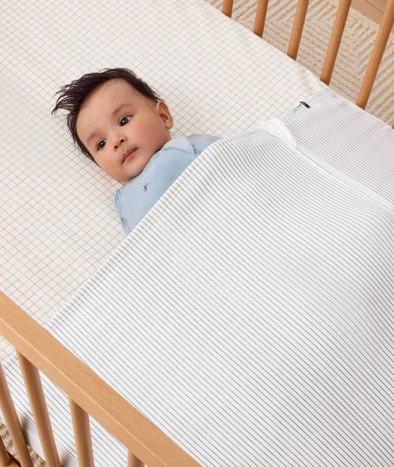 HugMe Blanket Midnight Stripe newborn tucked in