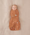 Baby wearing a Cocoon Swaddle Bag 1.0T Sunny