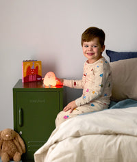 Blobby Bedtime Lamp Taupe child pressing on the product to change the light colour