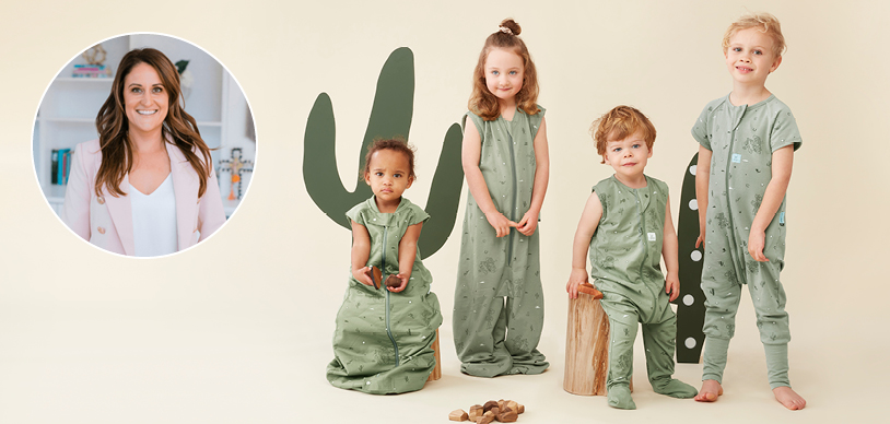Four toddlers and preschooler kids wearing green ergoPouch sleepwear next to Amanda Abel, paediatric psychologist