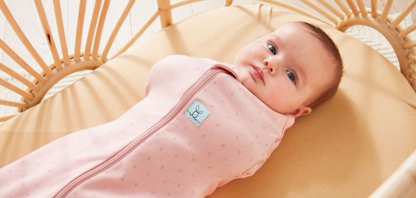 Baby wearing a cocoon swaddle bag